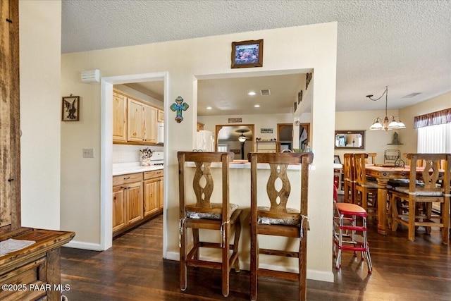 1819 Mountain View Ln, Prescott, AZ 86301 - dining area with dark wood-type flooring and a textured ceiling