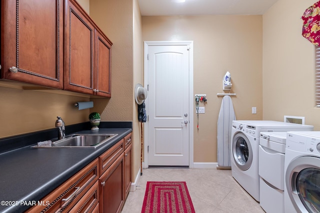 1646 Constable St, Prescott, AZ 86301 - laundry room featuring washing machine and clothes dryer, cabinet space, and light tile patterned flooring
