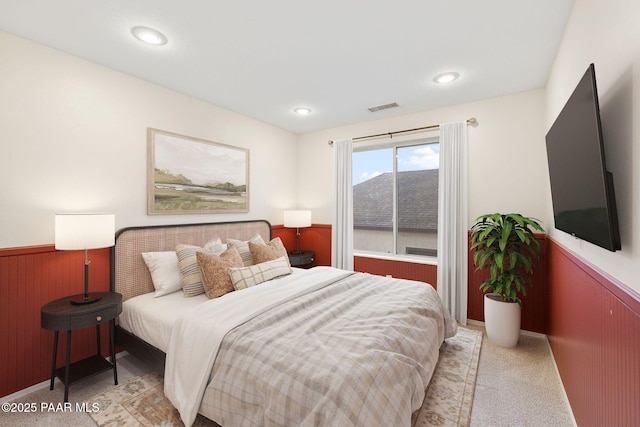 7070 E Lantern Ln, Prescott Valley, AZ 86314 - bedroom with a wainscoted wall, carpet, and wood walls