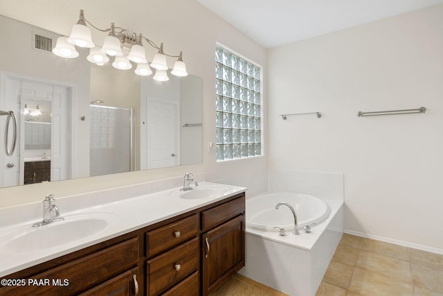 7070 E Lantern Ln, Prescott Valley, AZ 86314 - full bath featuring a bath, a stall shower, double vanity, and tile patterned floors