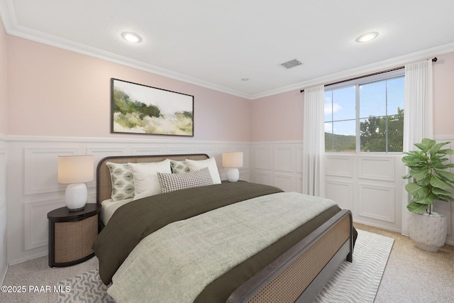 7070 E Lantern Ln, Prescott Valley, AZ 86314 - bedroom with a wainscoted wall, ornamental molding, light colored carpet, and a decorative wall