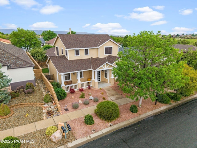 7070 E Lantern Ln, Prescott Valley, AZ 86314 - traditional home featuring a shingled roof and a porch
