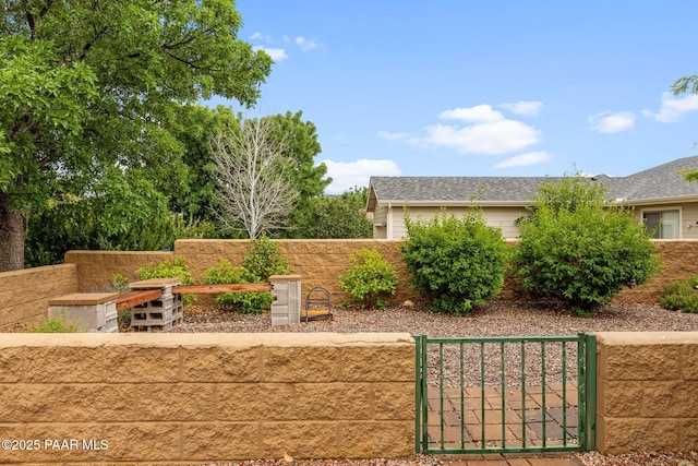 7070 E Lantern Ln, Prescott Valley, AZ 86314 - view of patio / terrace with a fenced front yard and a gate