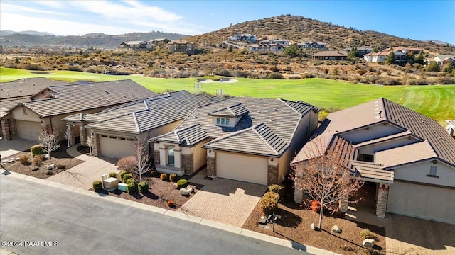 drone / aerial view featuring a mountain view