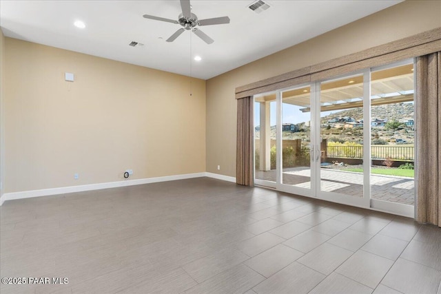 unfurnished room featuring ceiling fan