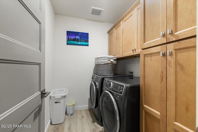 4956 E Ramada Dr, Prescott, AZ 86301 - washroom with cabinet space, light wood finished floors, and independent washer and dryer