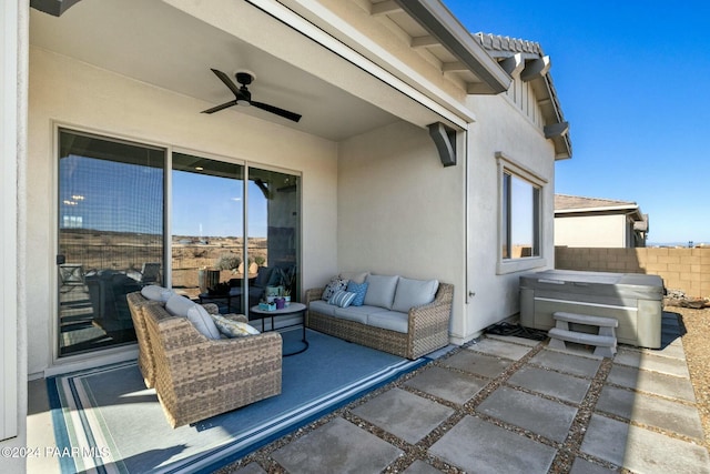 view of patio featuring a hot tub and ceiling fan