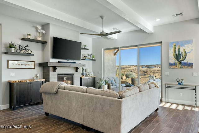 living room with beamed ceiling, ceiling fan, and dark hardwood / wood-style flooring