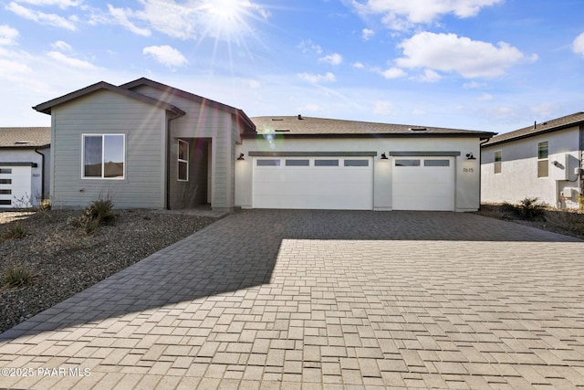 view of front of house with a garage