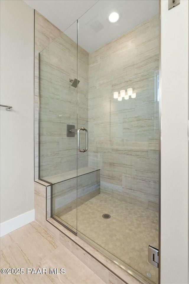 unfurnished room featuring wood finished floors, baseboards, and visible vents