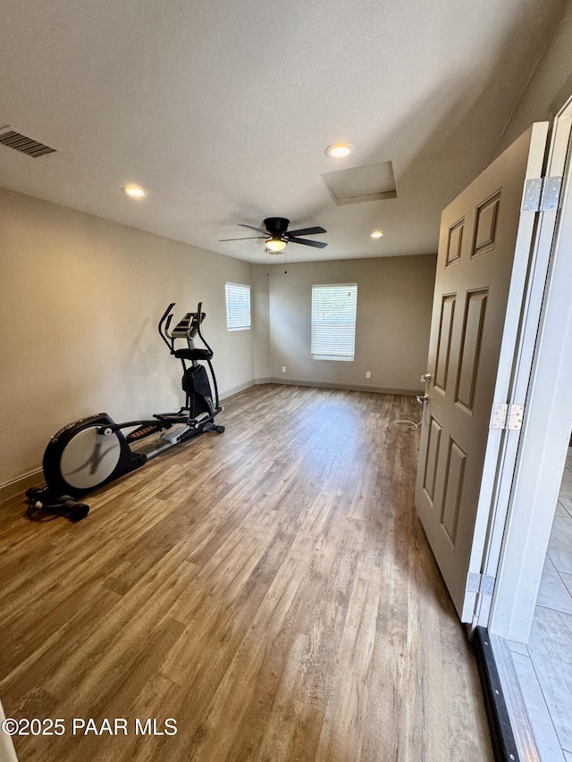 7728 E Vista Cir, Prescott Valley, AZ 86314 - exercise area featuring wood finished floors, baseboards, recessed lighting, and a ceiling fan