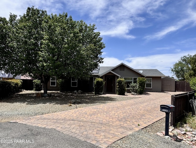 7728 E Vista Cir, Prescott Valley, AZ 86314 - view of front of home featuring decorative driveway and stucco siding