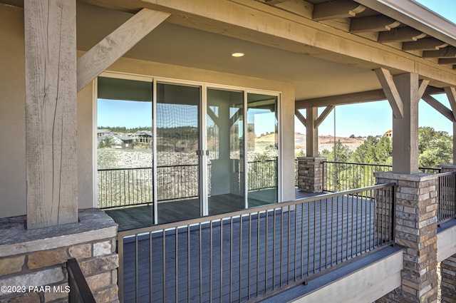 view of patio / terrace with a balcony