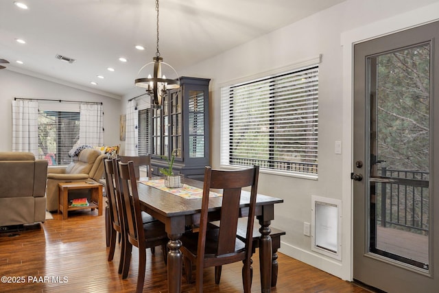 1210 Tanglewood Rd, Prescott, AZ 86303 - dining space featuring a chandelier, recessed lighting, wood finished floors, and vaulted ceiling