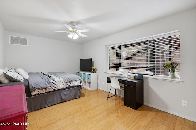 1210 Tanglewood Rd, Prescott, AZ 86303 - bedroom featuring wood finished floors, an office area, baseboards, and ceiling fan