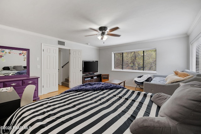 1210 Tanglewood Rd, Prescott, AZ 86303 - bedroom with crown molding, light wood-type flooring, baseboards, and ceiling fan