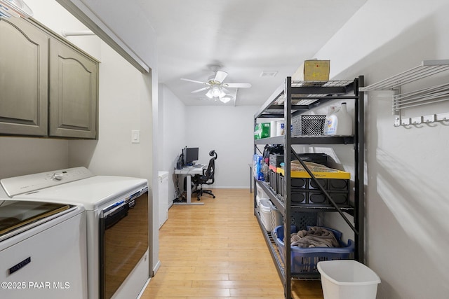 1210 Tanglewood Rd, Prescott, AZ 86303 - washroom featuring washing machine and dryer, cabinet space, light wood finished floors, a ceiling fan, and a desk