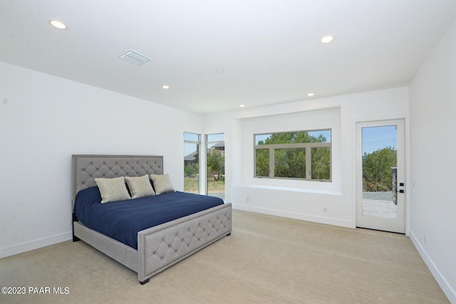 carpeted bedroom featuring access to outside, visible vents, baseboards, and recessed lighting