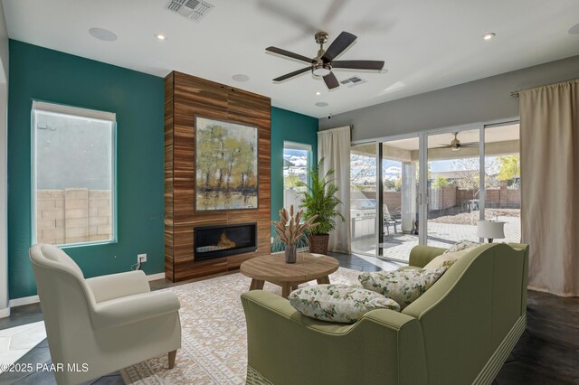 5393 Crescent Edge Dr, Prescott, AZ 86301 - living room with ceiling fan, a large fireplace, baseboards, and recessed lighting