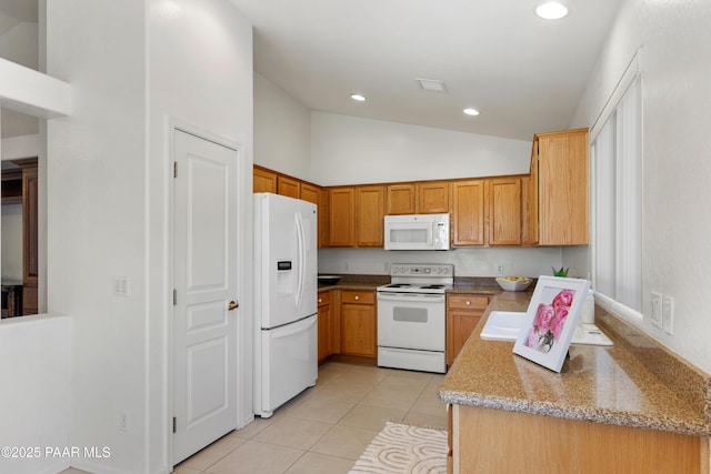 1634 Addington Dr, Prescott, AZ 86301 - kitchen with white appliances, light tile patterned flooring, recessed lighting, light stone counters, and brown cabinetry