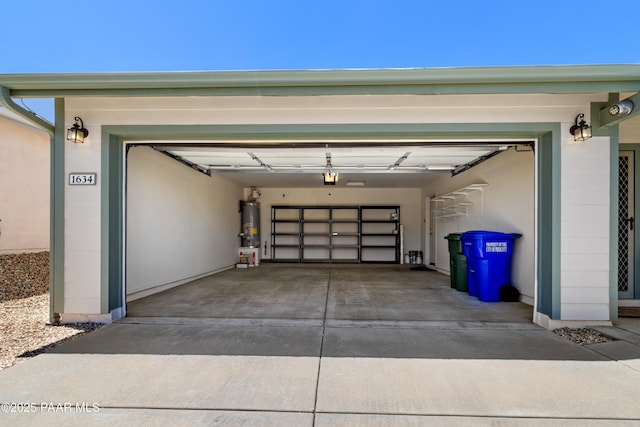1634 Addington Dr, Prescott, AZ 86301 - garage with water heater, concrete driveway, and a garage door opener