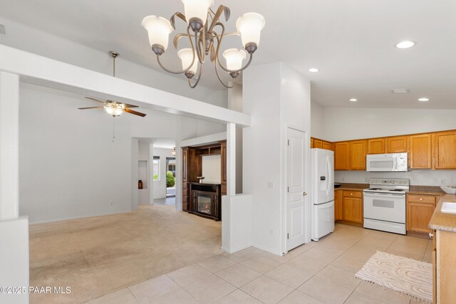 1634 Addington Dr, Prescott, AZ 86301 - kitchen with white appliances, light carpet, recessed lighting, high vaulted ceiling, and ceiling fan