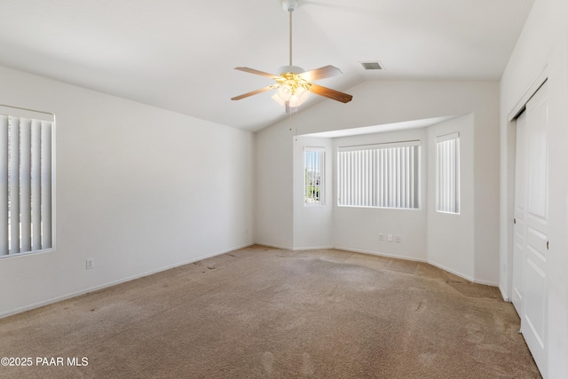 1634 Addington Dr, Prescott, AZ 86301 - unfurnished bedroom with lofted ceiling, carpet floors, a closet, and a ceiling fan