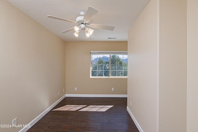4860 W Stazenski Rd, Prescott, AZ 86305 - unfurnished room with baseboards, a ceiling fan, wood finished floors, and visible vents