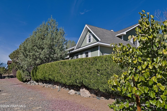4860 W Stazenski Rd, Prescott, AZ 86305 - view of home's exterior featuring a shingled roof
