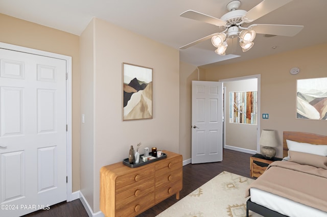 4860 W Stazenski Rd, Prescott, AZ 86305 - bedroom with baseboards, ceiling fan, and dark wood-type flooring