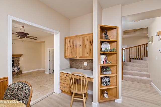 4860 W Stazenski Rd, Prescott, AZ 86305 - office area featuring ceiling fan, baseboards, and light wood-style floors