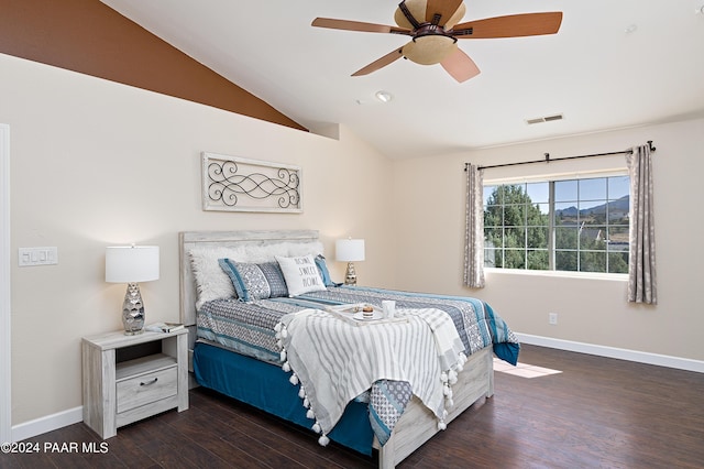 4860 W Stazenski Rd, Prescott, AZ 86305 - bedroom with baseboards, vaulted ceiling, wood finished floors, and visible vents