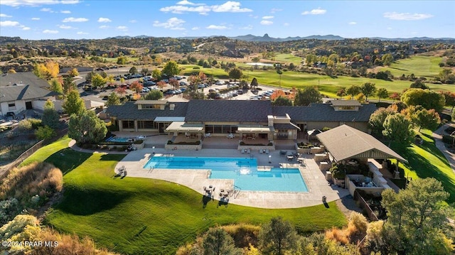 birds eye view of property featuring a mountain view