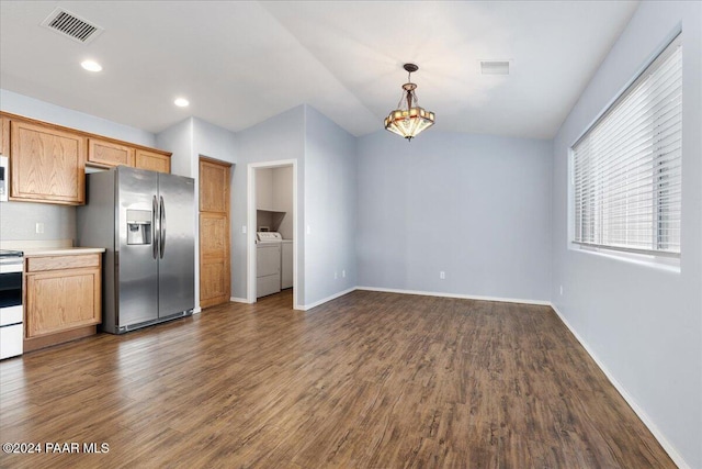 kitchen with washer and clothes dryer, dark hardwood / wood-style floors, pendant lighting, and appliances with stainless steel finishes