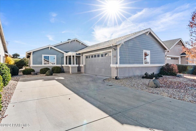 ranch-style home featuring a garage