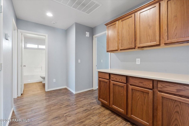 kitchen with light hardwood / wood-style flooring