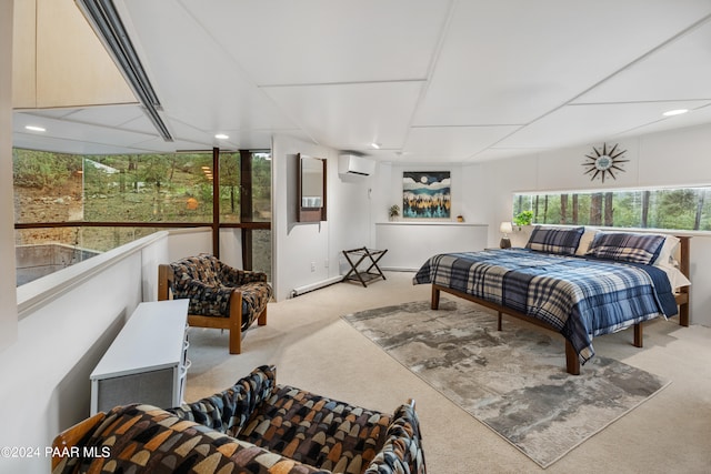 carpeted bedroom with a wall mounted AC