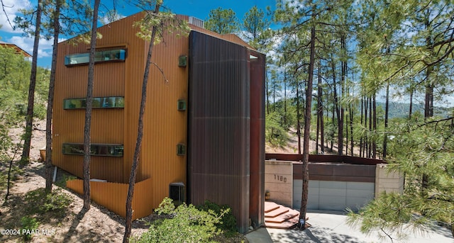 view of outbuilding with a garage