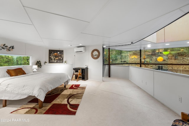 bedroom featuring a wall mounted AC and light carpet