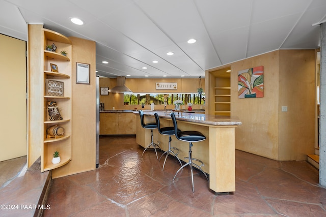 bar featuring range hood