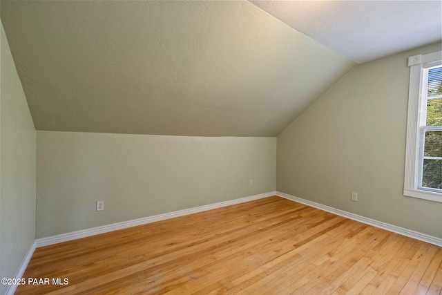 213 N Virginia St, Prescott, AZ 86301 - bonus room with vaulted ceiling, light wood-style flooring, and baseboards