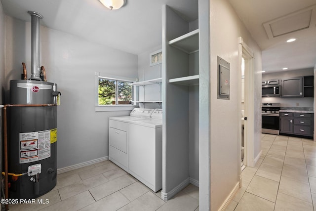 213 N Virginia St, Prescott, AZ 86301 - laundry room with independent washer and dryer, gas water heater, light tile patterned floors, baseboards, and recessed lighting