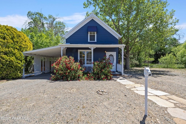 213 N Virginia St, Prescott, AZ 86301 - view of front of house featuring a porch, an attached carport, and driveway