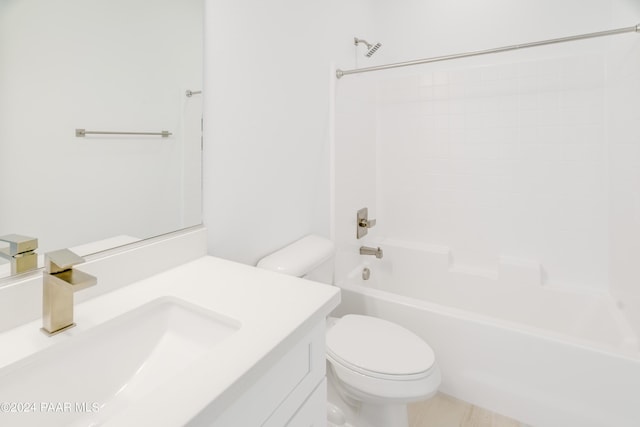 full bathroom featuring shower / bathing tub combination, vanity, and toilet