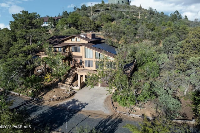 1104 Country Club Dr, Prescott, AZ 86303 - view from above of property with a heavily wooded area