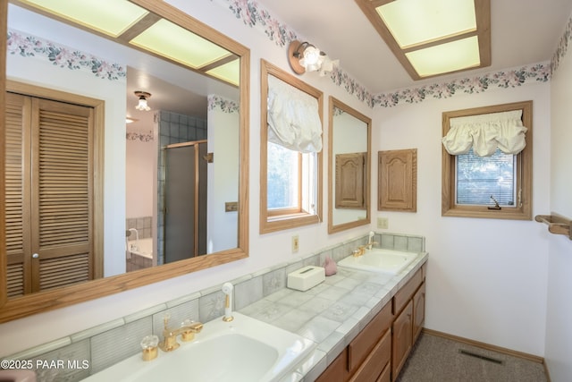 1104 Country Club Dr, Prescott, AZ 86303 - bathroom featuring plenty of natural light, a stall shower, double vanity, and a closet