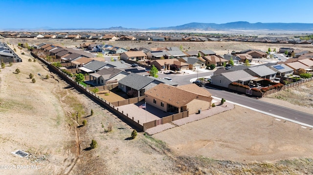 drone / aerial view with a mountain view and a residential view