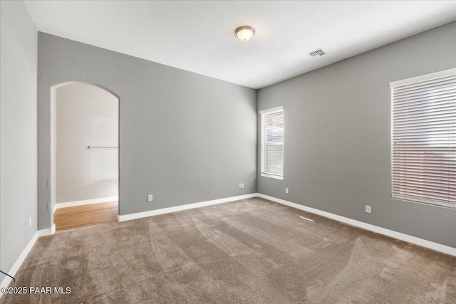 unfurnished room with carpet