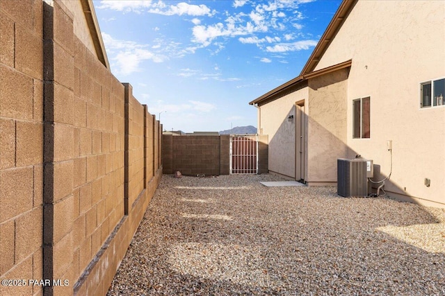 view of yard featuring central AC