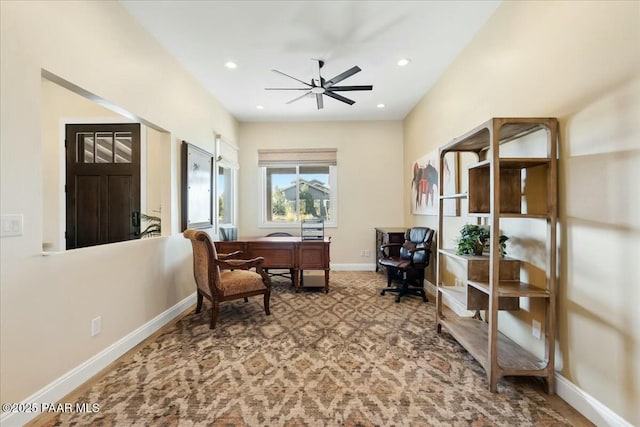 office featuring ceiling fan and carpet flooring